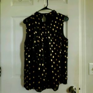 Beautiful black and gold sleeveless shirt.